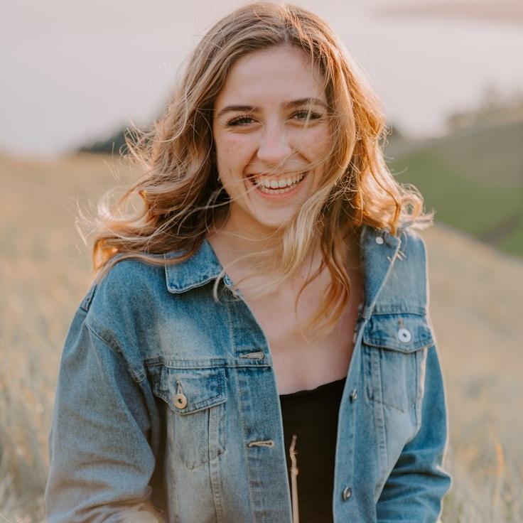 Alex Carter, Lead Design Curator at Stem & Story Studio, reviewing corporate floral arrangements